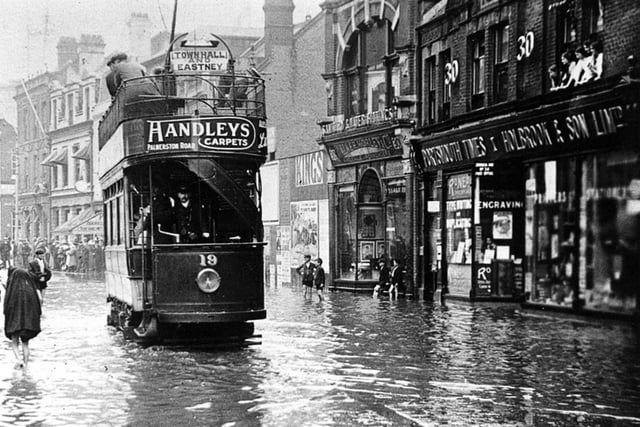 Portsmouth Corporation electric tram No 19 negotiating floods in Commercial Road  in August 1911.