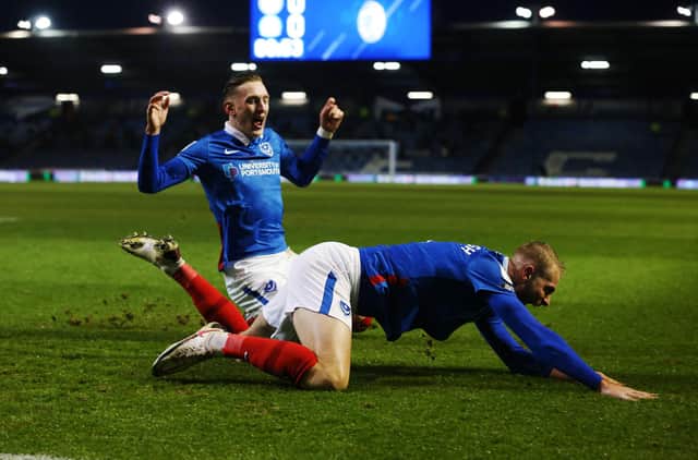 Portsmouth's Jack Whatmough celebrates scoring his first goal of the match
