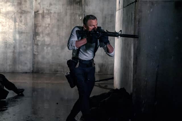 Daniel Craig as James Bond in No Time To Die. The film will finally be released in the UK on September 30 after more than a year of delays because of the Covid-19 pandemic. Picture date: Tuesday August 31, 2021. Photo: Nicola Dove/2021 DANJAQ, LLC AND MGM