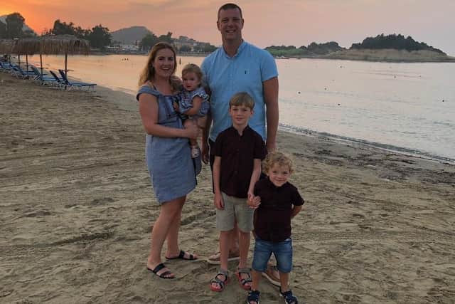 Max Ferrand pictured holding his older brother Toby's hand, with his mum and dad Leanne and Brett Ferrand, and sister Phoebe. Picture: Family