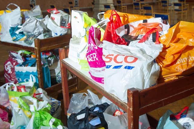 Father Bob and reverend Sam Collins handing over donations to Carole Damper from the Roberts Centre for the Harvest handover at St Mary's Church, Fratton, Portsmouth on 8 October 2020
Pictured: Some of the donations at St Marys Church.
Picture: Habibur Rahman