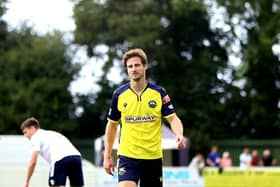 Elliott Wheeler walks off the pitch after his early red card at Yate. Picture: Tom Phillips