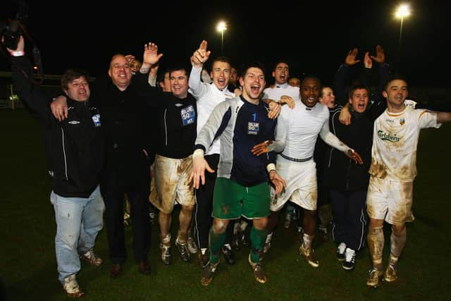 Kevin Scriven and his Hawks colleagues celebrate after beating Swansea City. Photo by Mike Hewitt/Getty Images.