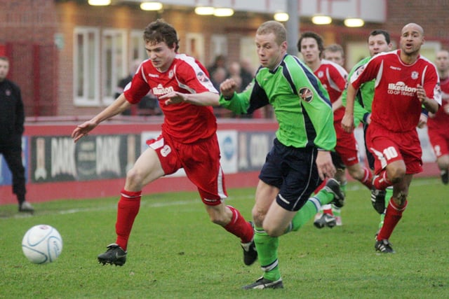 Adam Muller races with ex-Robin Glenn Kirkwood in a Boxing Day clash with Matlock at the NMG.