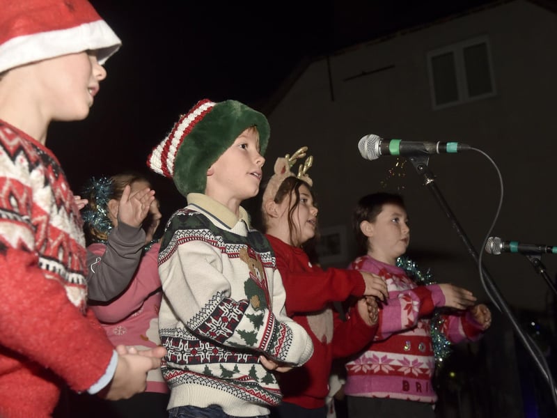 Emsworth Christmas Lights were switched on during Friday evening, November 28, 2025, in St Peter's Square, Emsworth.Pictured is: Children singing from Thorney Island Community Primary School.Picture: Sarah Standing (281125-3228)