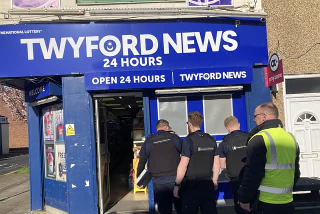 Immigration officers arrested five suspected illegal workers at a Stamshaw house and newsagents Twyford News. Pic Steve Deeks
