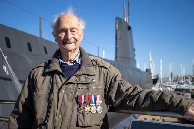 Geoffrey 'Pip' Calvert visiting HMS Alliance, the submarine he once served on during its active service Picture: Alex Shute