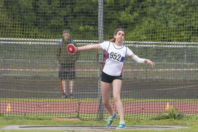 Charlotte Pabari on her way to winning the under-13 girls discus at the Mountbatten Centre. Picture by Paul Smith