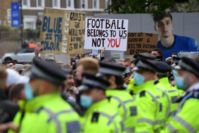 Chelsea fans protest against the  proposed European Super League at Stamford Bridge last night. Photo by Mike Hewitt/Getty Images.