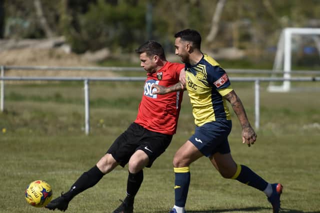 Garry Austin, left, netted for Fareham in their defeat at Blackfield & Langley. Picture: Allan Hutchings (030421-176)