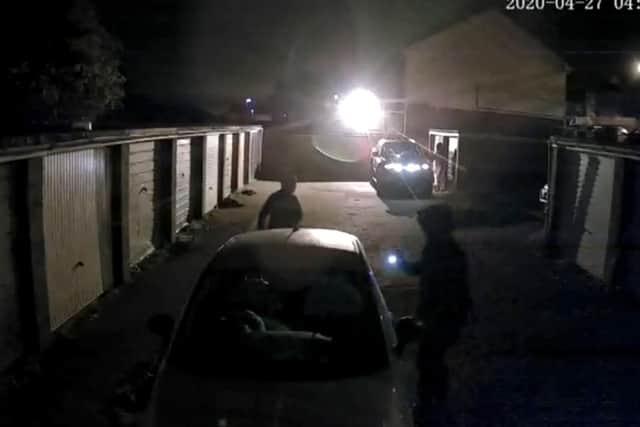 CCTV footage has captured three individuals attempting to gain entry of cars and vehicles in a parking area off Dore Avenue, Portchester, on Monday morning.