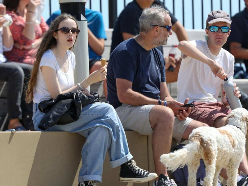 Crowds made the most of the sunny weather to catch a glimpse of the yachts returning to Portsmouth.Picture: Chris  Moorhouse (270724-40)