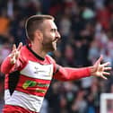 Former Pompey midfielder Ben Close celebrates scoring in Doncaster's 2-1 win over Gillingham at the weekend. Picture: Howard Roe/AHPIX LTD