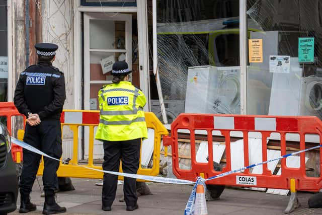 A police car has allegedly crashed into the front of a shop on Albert Road.

Pictured - The resulting damage and police on scene

Photos by Alex Shute