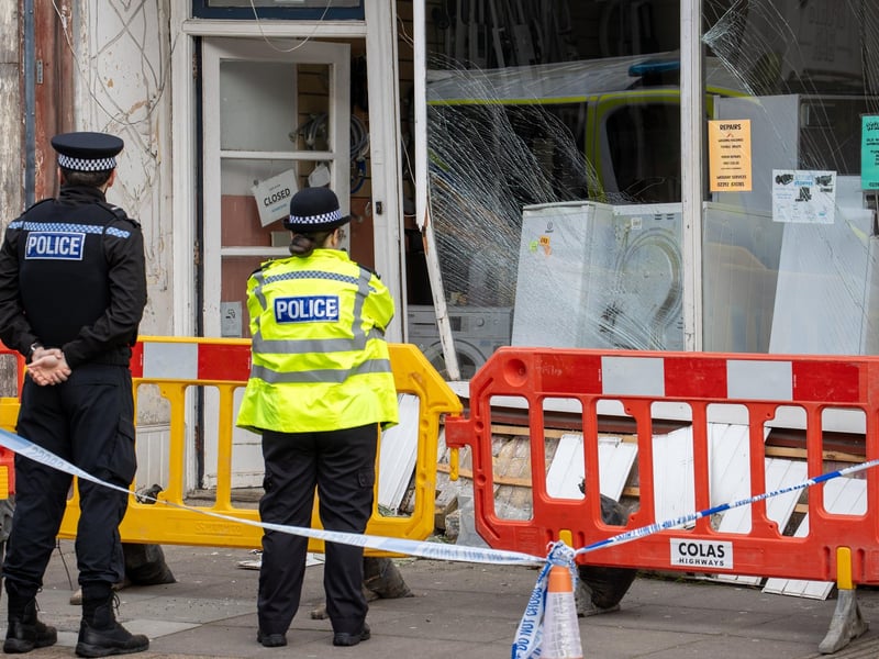 A police car has allegedly crashed into the front of a shop on Albert Road.
Pictured - The resulting damage and police on scene
Photos by Alex Shute
