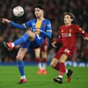 Sean Goss in action against Liverpool last year. (Photo by Gareth Copley/Getty Images)
