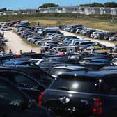 QUEUES: The main car park at Durdle Door, Dorset, earlier this week. Picture: PA