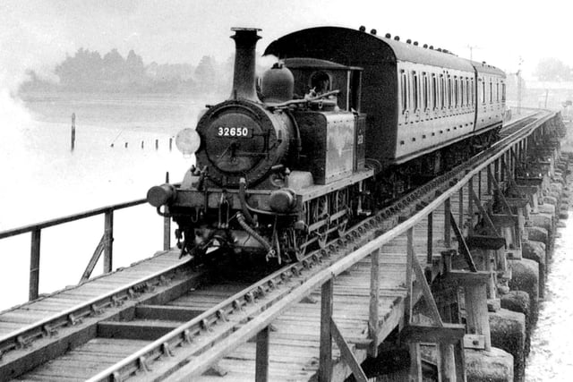 Sent in by David Taylor of Bedhampton, we see the train heading south over Langstone Bridge.
It was said at the time that the state of the wooden bridge was the reason the line was closed on 4 November 1963.