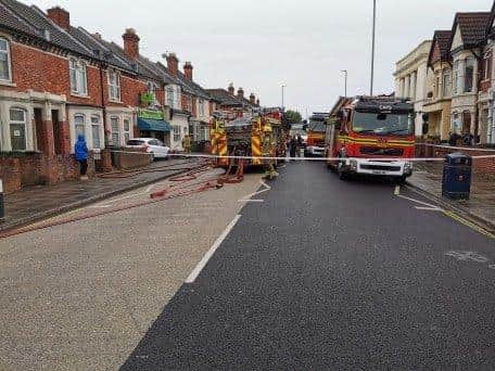 Firefighter tackle the kitchen blaze at The Wonderful Eat takeaway.
