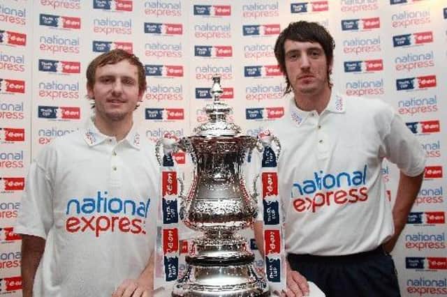 Flashback - Shaun Wilkinson (left) and Hawks colleague Brett Poate with the FA Cup prior to playing at Anfield in 2008. Pic: Dave Haines.