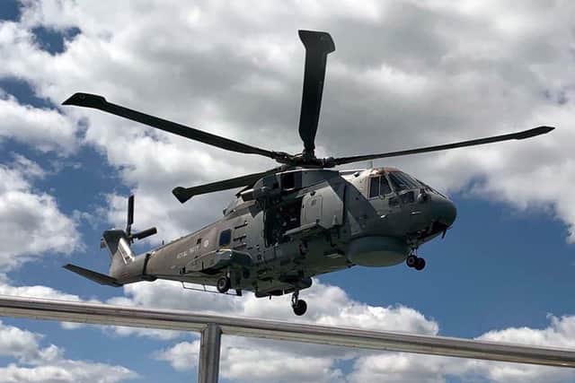 The Merlin as it flies above HMS Magpie during the rescue training mission. Photo: Royal Navy
