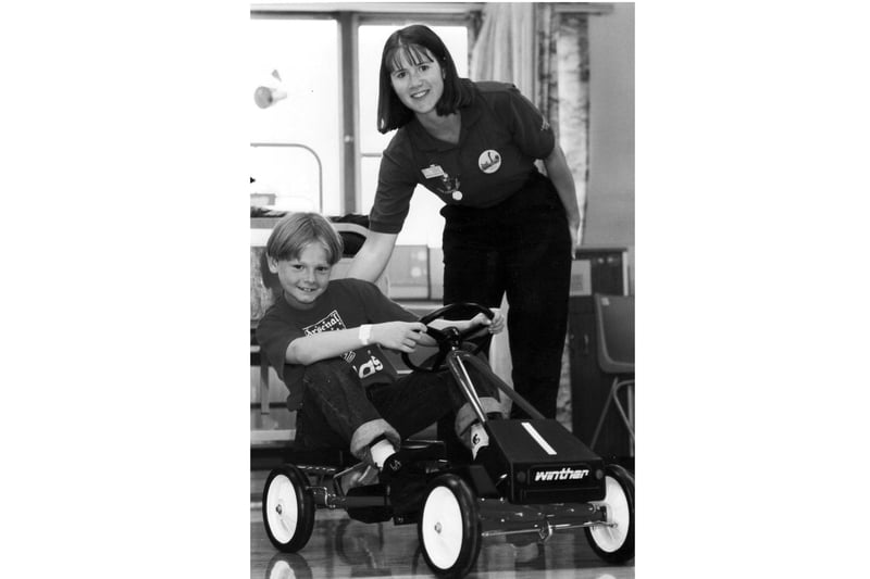 Adam Easton on one of the new pedal cars in June 1994