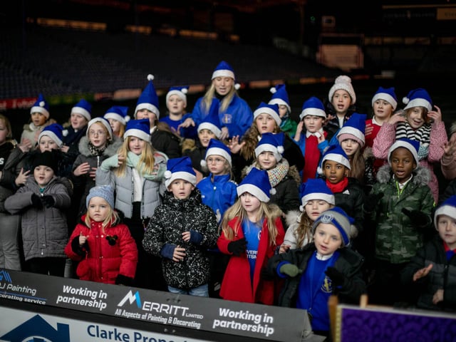 Year R to Year 6 pupils of St John's Primary, Gosport using Makaton and singing at the event