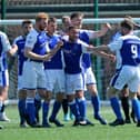 Denmead celebrate their opening goal against Clanfield. Picture: Chris Moorhouse