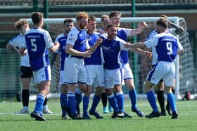 Denmead celebrate their opening goal against Clanfield. Picture: Chris Moorhouse