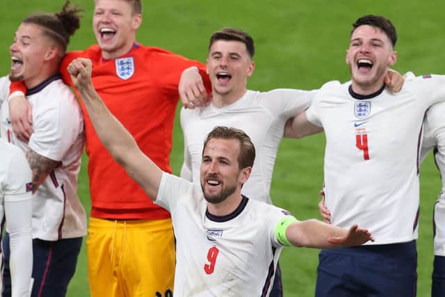 England players celebrate last night's victory. Picture: Catherine Ivil, AFP via Getty Images.
