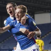 Harvey White celebrates his goal in Pompey's win at Oxford. Picture: Jason Brown