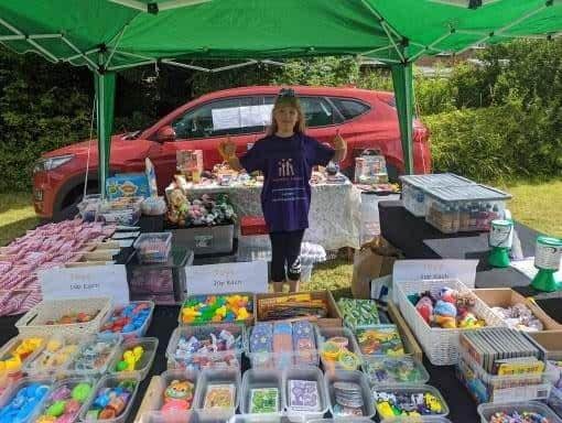 Grace at one of her fundraising stalls. 