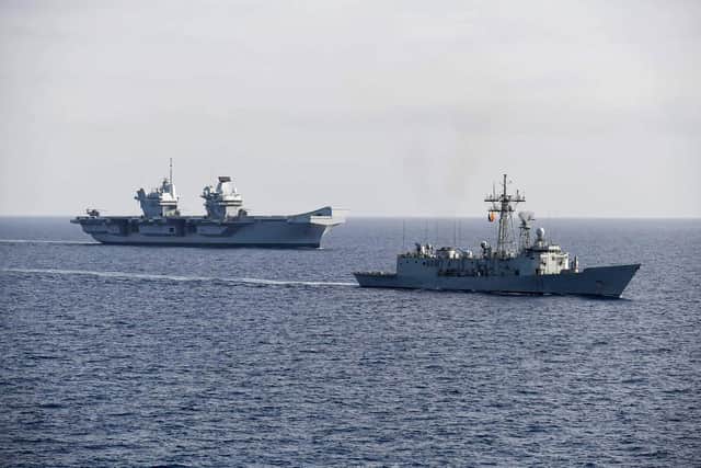 Pictured: HMS Prince of Wales and Spanish frigate Victoria (F82).