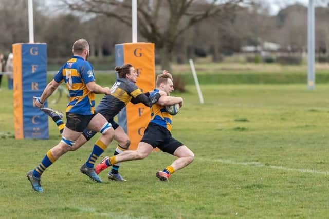 Rob MacKinnon on his way over in Gosport's win over Ellingham & Ringwood Picture: Martin Burnett