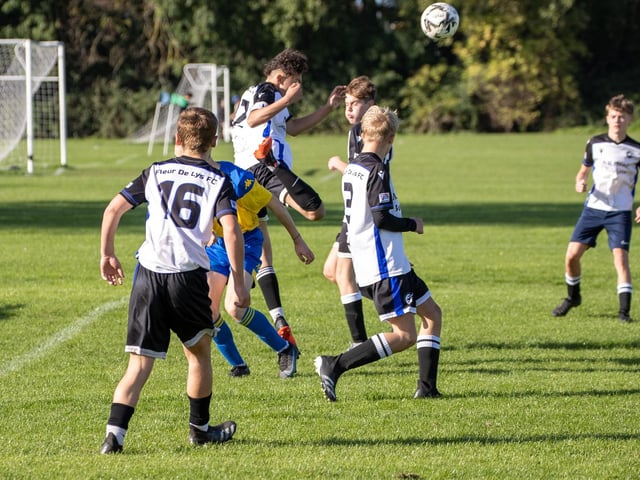 Fleur De Lys Victory U16s (white) v Petersfield. Picture by Alex Shute