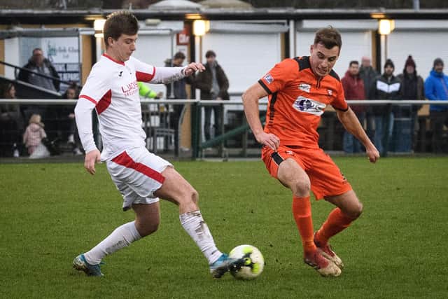 Sam Hookey, left, made his 250th Horndean appearance in a 3-0 Wessex League win at Portland.

Picture: Keith Woodland