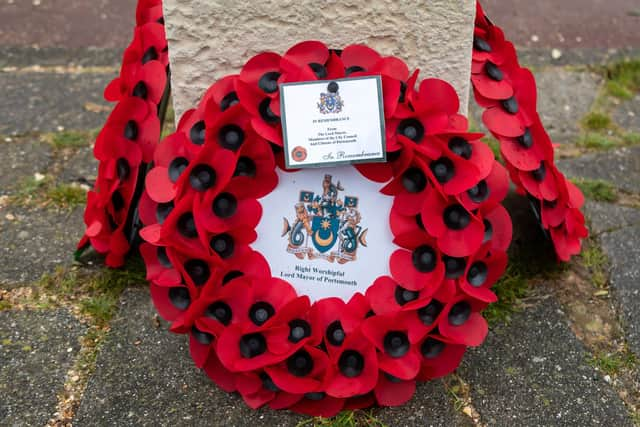 Wreaths laid at the Cockleshell statue at Lumps Fort. Picture: Mike Cooter (111222)