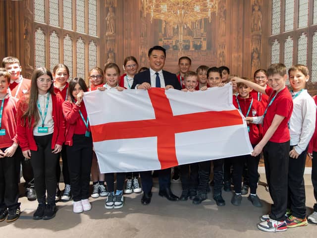 Pupils from Trosnant Junior School with Alan Mak MP during their visit to Parliament