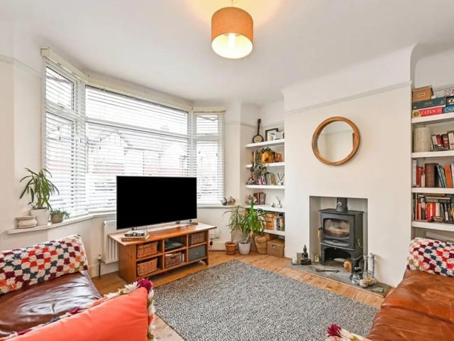 The listing says: "With no forward chain this three bedroom 1930s home boasts stunning original features, parking for two cars and garage to the rear. Internally it benefits from a conservatory, ground floor cloakroom and westerly facing rear garden. Positioned within the sought after Court Lane area of Drayton, close to local schools and parks - it's a great family or first time purchase."