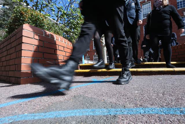 Pupils follow the lines which mark their routes around the school.
Picture: Chris Moorhouse (090920-18)
