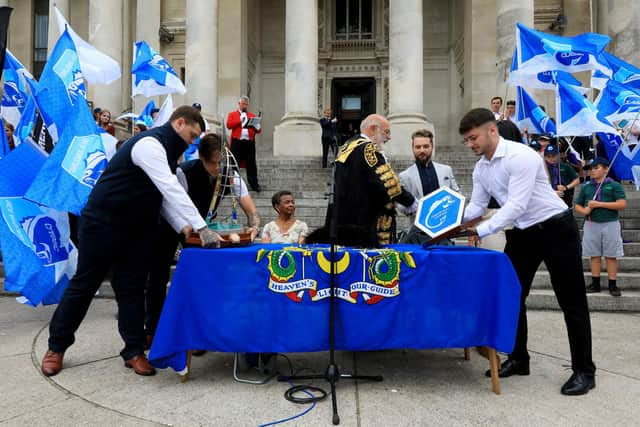 The trophies made by apprentices at BAE Systems are shown to the crowd. Sea Angling Festival opening parade, Guildhall Square, PortsmouthPicture: Chris Moorhouse (jpns 150622-11)