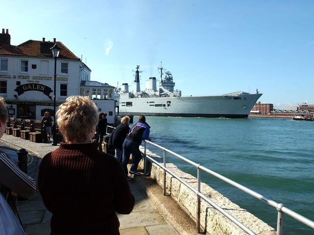 Well wishers watch HMS Invincible return to Portsmouth Harbour 2nd April 2004. Picture: Steve Reid (041735-90)