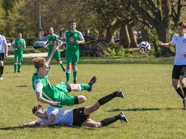 East Lodge's Olly Martin (white) makes a tackle during his side's 2-2 draw with Carberry. Picture: Mike Cooter.