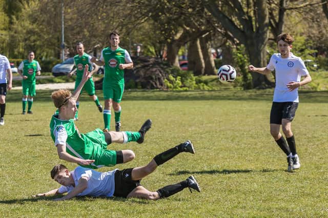 East Lodge's Olly Martin (white) makes a tackle during his side's 2-2 draw with Carberry. Picture: Mike Cooter.