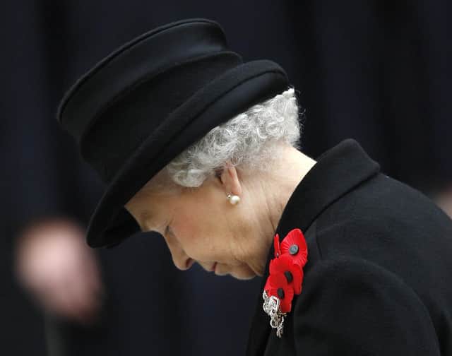 Queen Elizabeth II listens to a prayer during the Remembrance Sunday service at The Cenotaph in London (photo: Adrian Dennis/AFP via Getty Images)