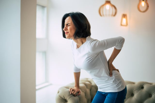 Pains in your tummy and back are common signs of pancreatic cancer and may start with a general discomfort or tenderness in your stomach and spread to your back. The pain may feel worse when you are eating or lying down, and feel better while leaning forward.