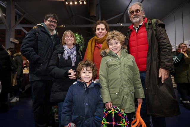 The Horton family enjoy the Love Southsea Christmas Market at Portsmouth Historic Dockyard. Picture: Chris  Moorhouse (231124-22)