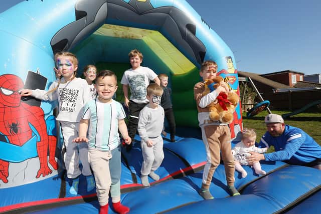 Children on the bouncy cstle. Fundraiser at the Falcon pub, Waterlooville, for children's cancer charity Hannah's Holiday Home, in memory of Arthur Dormer who was stillborn after 26 weeks, last year
Picture: Chris Moorhouse (jpns 190322-39)