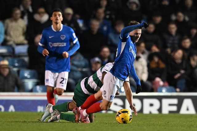 Adrian Segecic is fouled by Isaac Hayden in this afternoon's 1-1 draw. Picture: Graham Hunt/ProSportsImages