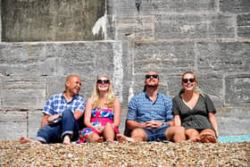 Pictured from left: A group of friends relax in the sun at the Hot Walls in Southsea, Portsmouth. 

Weather input. People enjoy the hot and sunny weather at Southsea Beach, Portsmouth. 

© Solent News & Photo Agency
UK +44 (0) 2380 458800